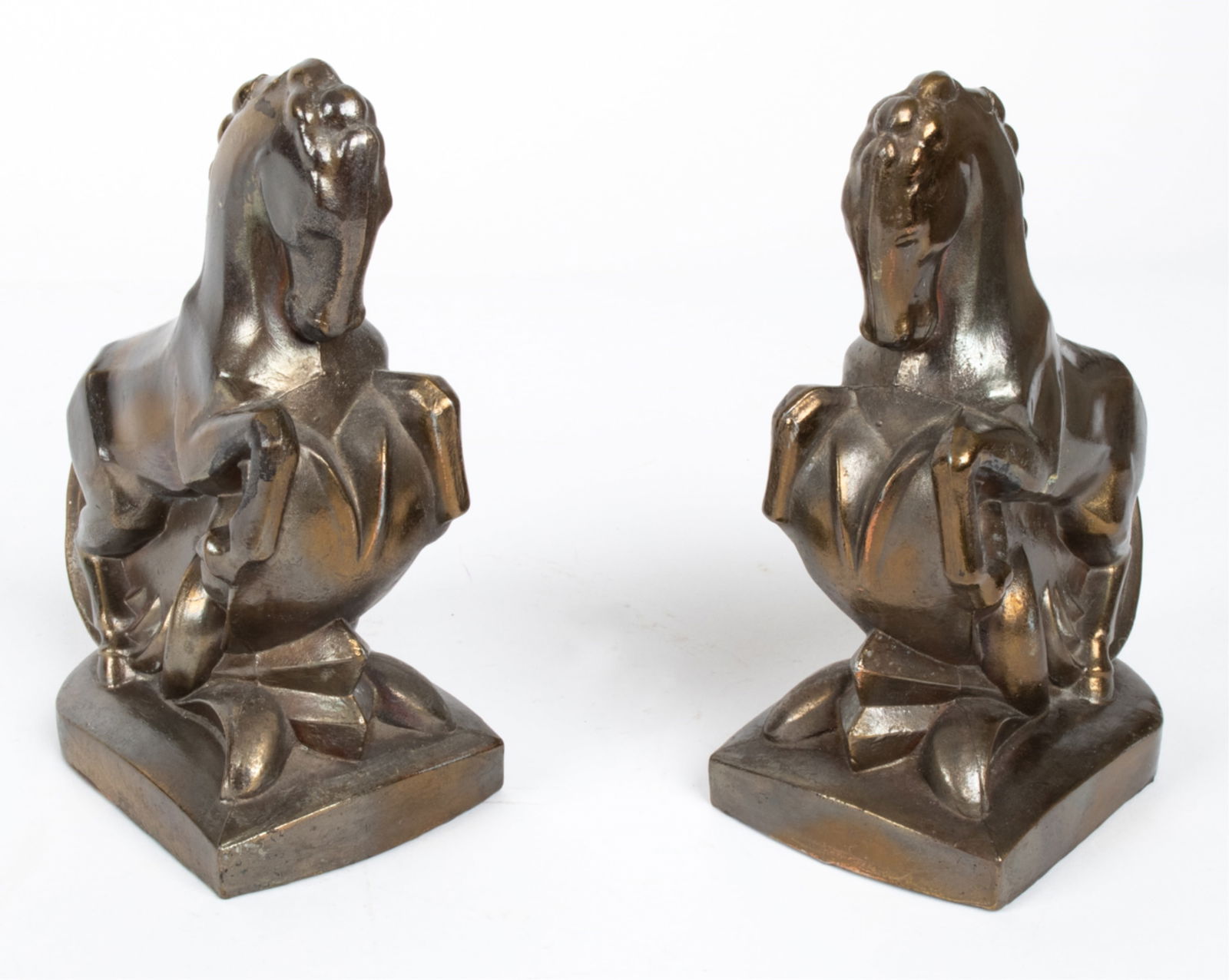 PAIR OF ART DECO CAST METAL HORSE BOOKENDS: Apparently unsigned. Dimensions: (Single) H 7" x W 5.5" x D 3" Condition: Intentionally patinated finish; with a few additional small scuffs and rubs.