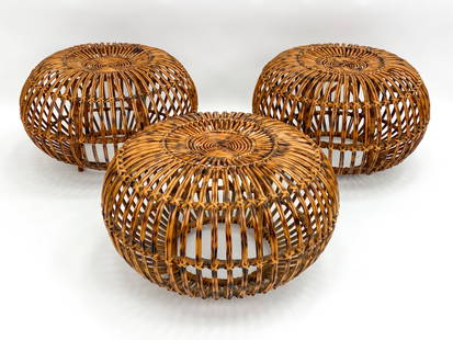 (3) FRANCO ALBINI ITALIAN RATTAN POUF OTTOMANS: Set of three rattan ottomans or stools by Franco Albini for Boncina Italy circa 1960s. Dimensions: H 14" x Dia. 24" Condition: Minor surface wear and a few scattered losses consistent with age and