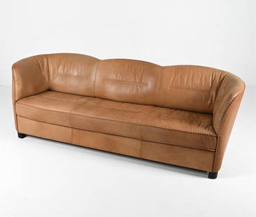 BERG DANISH WHIPSTITCH LEATHER SOFA C.70'S: Danish Modern three-seat sofa in tan patinated leather with whipstitch trim. Labeled Berg Furniture, c. 1970's. Dimensions: H 29" x W 84" x D 32" x SH 16.5" Condition: Natural patination and light wea