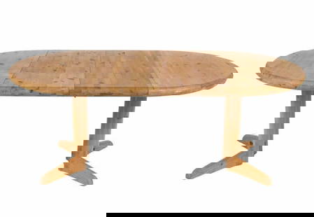 RAINER DAUMILLER PINE EXTENSION DINING TABLE: c. 1970's. Including (2) 18" leaves. Dimensions: (Without leaves) H 30" x Dia. 43" Condition: Wear consistent with age and use. PA002