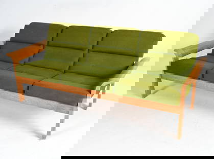 THYGESEN & SORENSEN FOR MAGNUS OLESEN SOFA: Danish Modern three-seat sofa in oak veneer over molded plywood, designed by Rud Thygesen and Johnny Sorensen for Magnus Olesen, c. 1970's. Dimensions: H 29" x W 74" x D 29" x SH 17" Condition: Great