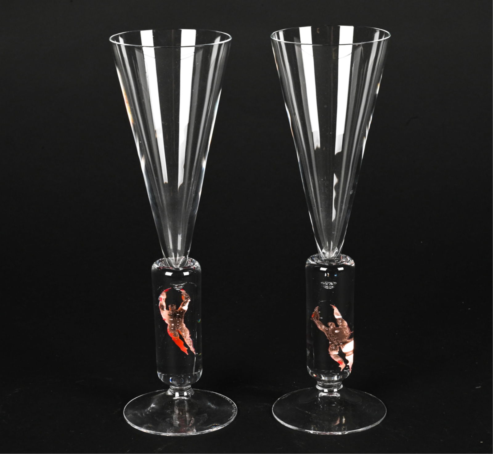 BERTIL VALLIEN KOSTA BODA CRYSTAL TOASTING FLUTES: Limited edition, hand-signed and numbered underneath. Dimensions: H 10.25" x Dia. 3.25" Condition: No issues to note. No signs of chips, cracks, or repairs.