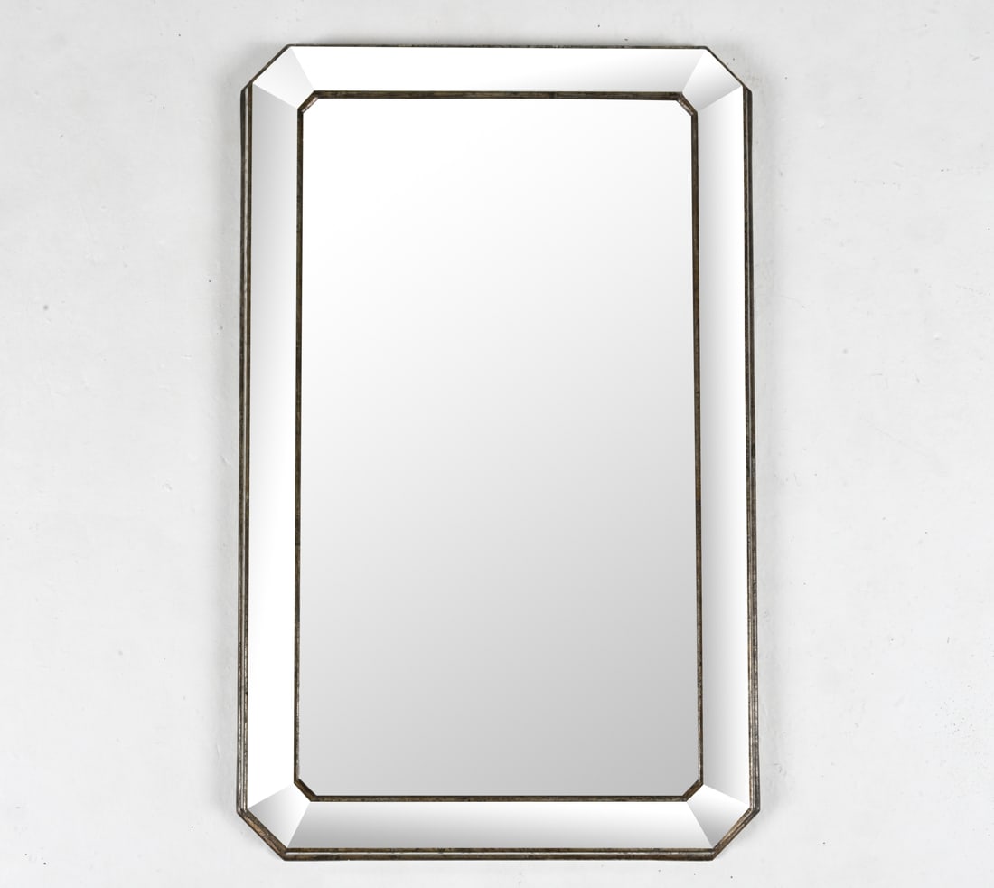 PANELED WALL MIRROR IN ANTIQUED SILVER FINISH: 20th Century. Dimensions: H 41.5" x W 25.5" Condition: Missing one glass panel at corner; several panels apparently re-glued. Intentionally antiqued finish, with a few additional dings and rubs.