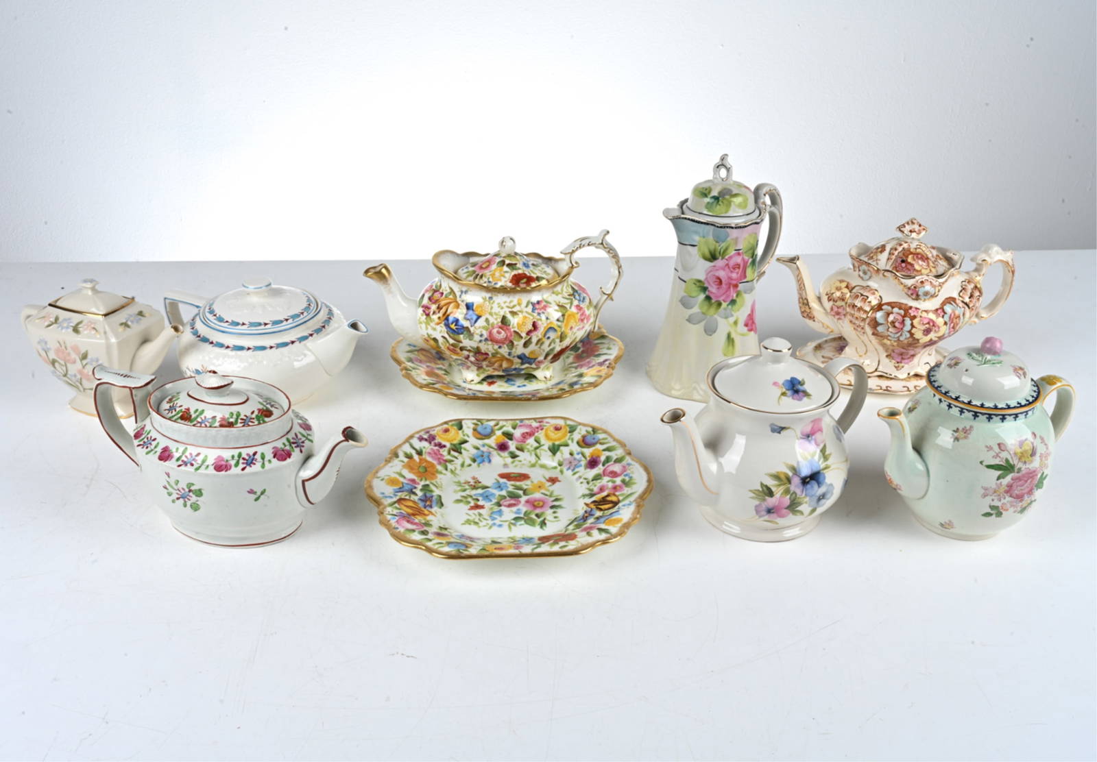 Grouping Of Teapots Auction
