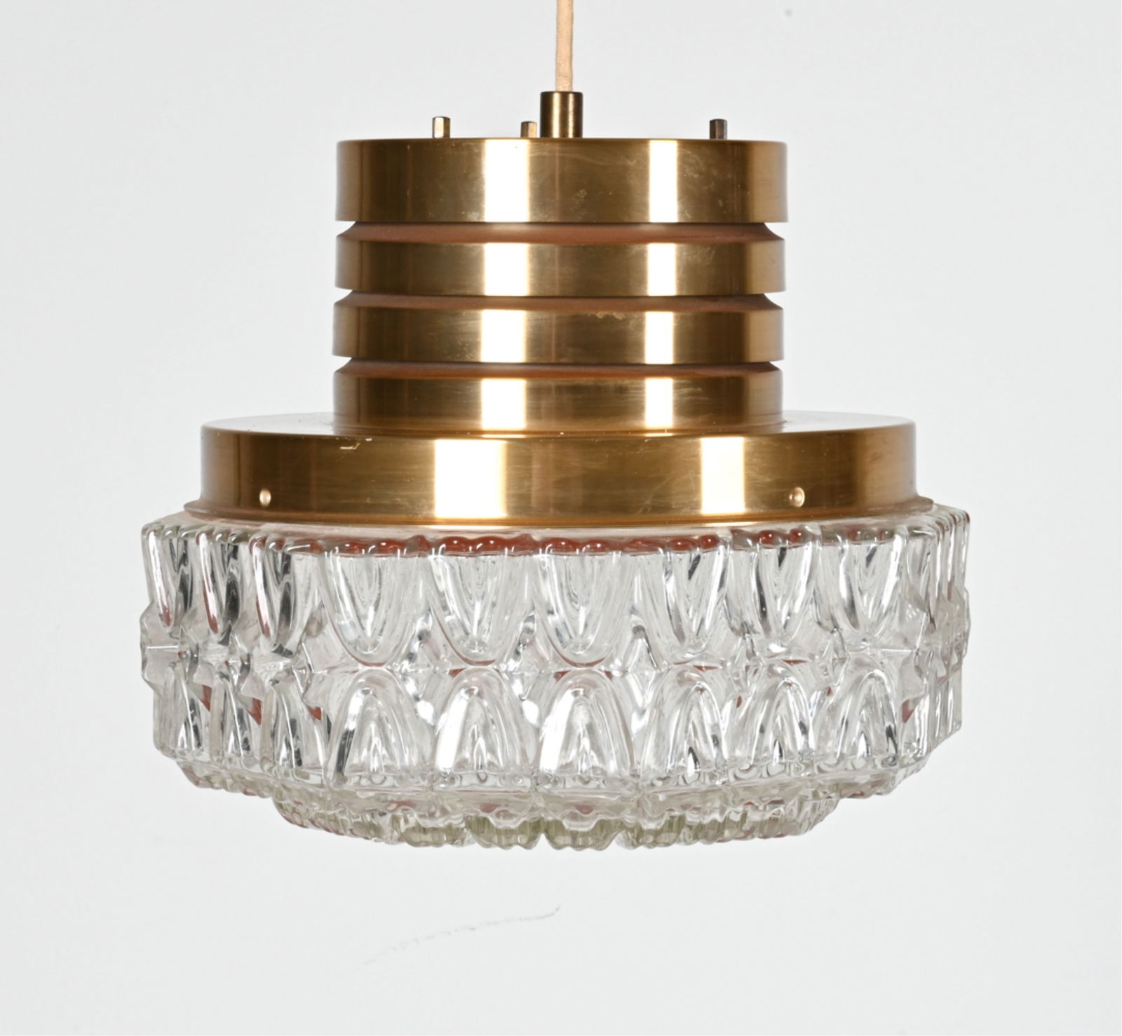 ATTR. CARL THORE FOR ORREFORS PENDANT LIGHT: Brushed goldtone metal and crystal, c. 1970's. Dimensions: H 11" x Dia. 12" Condition: Wiring not tested. Fixture presents beautifully overall; very few signs of wear. G243
