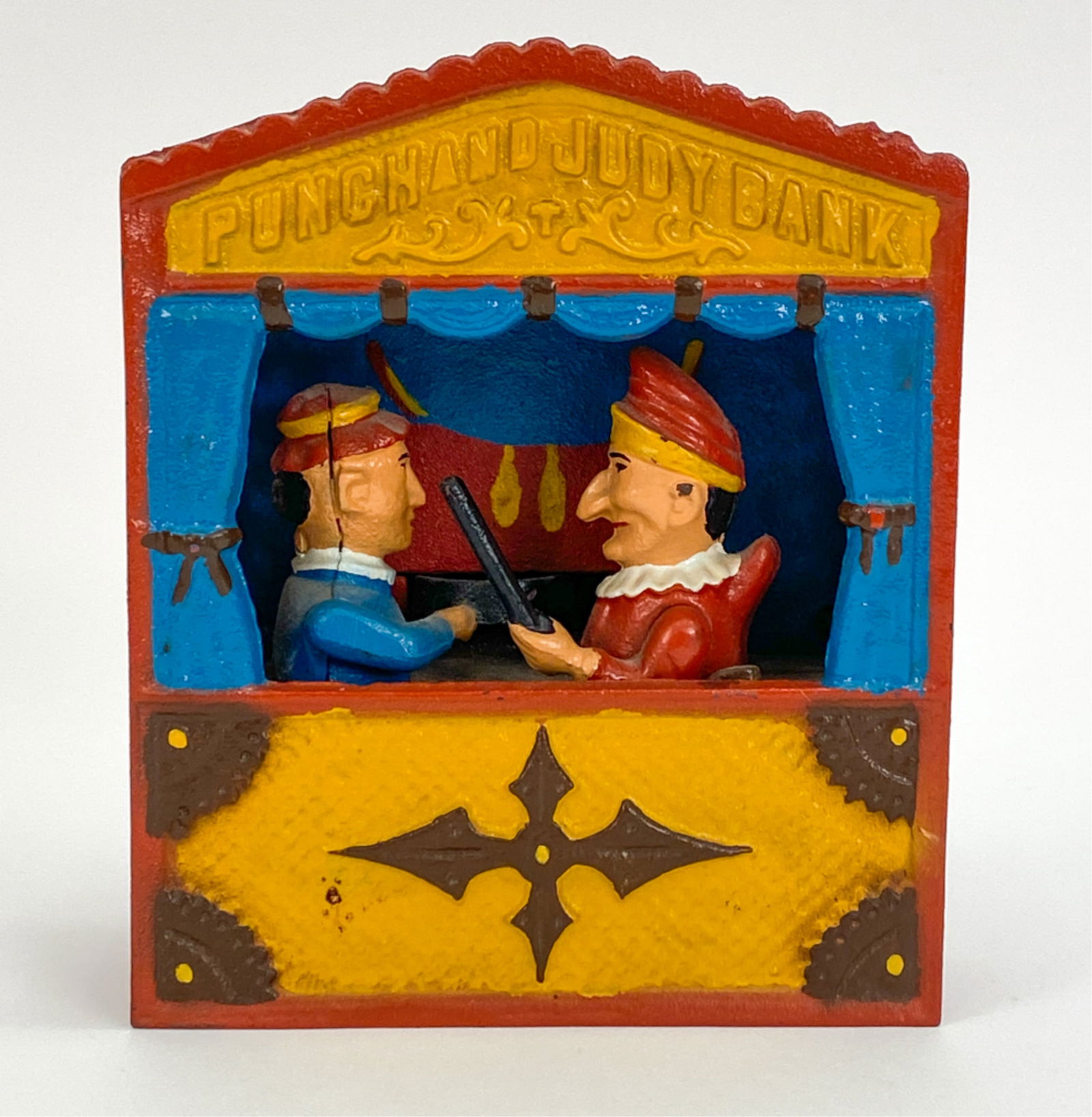 JOHN WRIGHT REPRO PUNCH & JUDY COIN BANK: Authentic reproduction Punch & Judy coin bank. Sand-cast, hand-painted and hand finished. Includes original Certificate of Authenticity, instructions and John Wright advertising tag. Dimensions: H 7.2