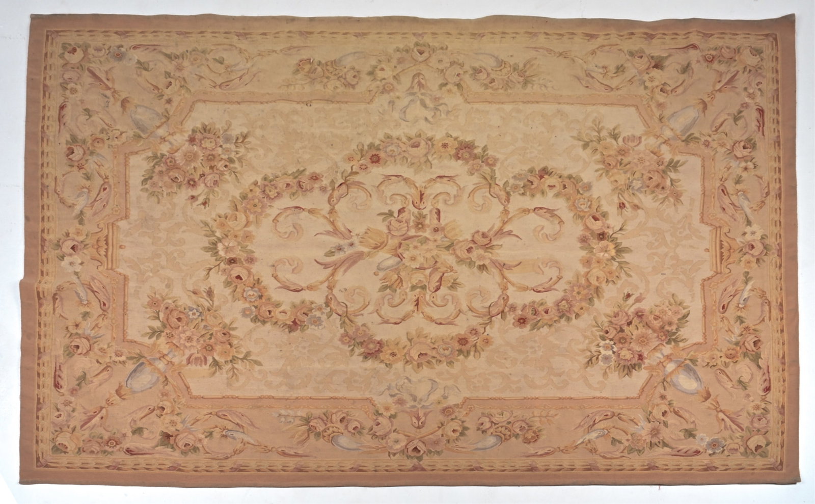 VINTAGE AUBUSSON TAPESTRY AREA RUG: Dimension: L 72" x W 111" Condition: Slight fading to the design of the rug. Areas of minor discoloration and soiling. Wear consistent with age and use.