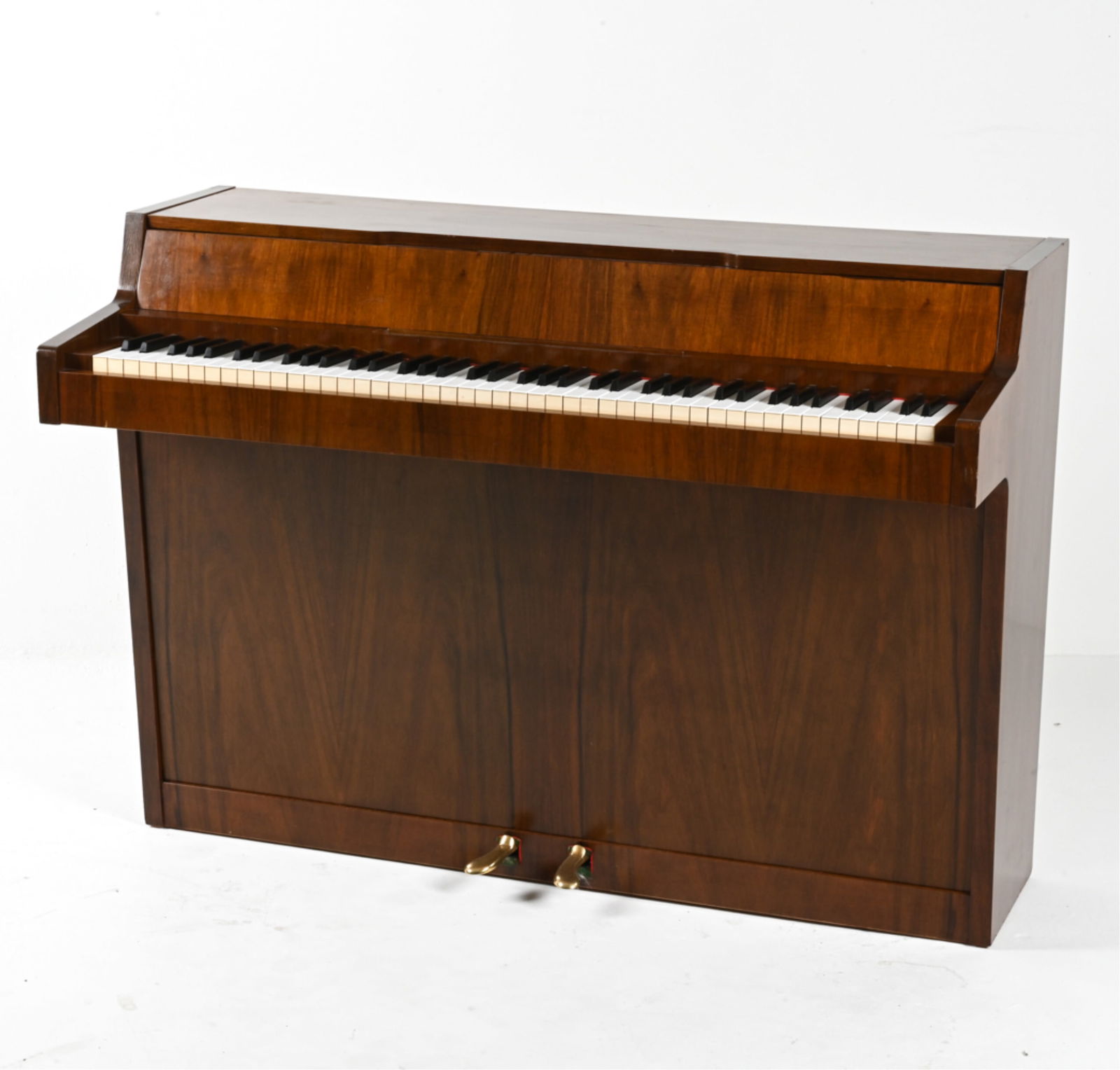 LOUIS ZWICKI DANISH MID-CENTURY WALNUT PIANETTE: With its compact silhouette and 82 keys (6 fewer than the standard 88 keys of a full-size piano) the pianette is uniquely suited for the modern space-conscious musician. This pianette - produced by th