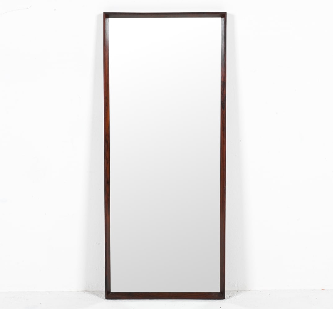 AARHUS DANISH ROSEWOOD WALL MIRROR: Labeled Aarhus with model No. 343 on reverse side. Dimensions: H 41.75" x W 17.5" Condition: A few light dings and rubs. G247-D