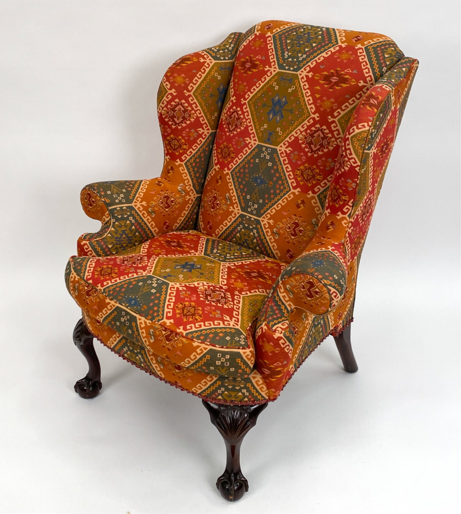 WINGBACK CHAIR: Unsigned. Dimensions: H 44.5" x W 39" x D 37" x SH Condition: Showing normal signs of use including a couple small marks.