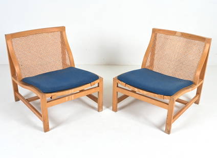 PAIR THYGESEN & SORENSEN FOR BOTIUM CANE CHAIRS: Pair of Danish Modern slipper chairs in beech wood and cane, designed by Rud Thygesen and Johnny Sorensen for Botium; labeled under seats. C. 1970's. Dimensions: H 27.5" x W 24" x D 28" S.H. 14"