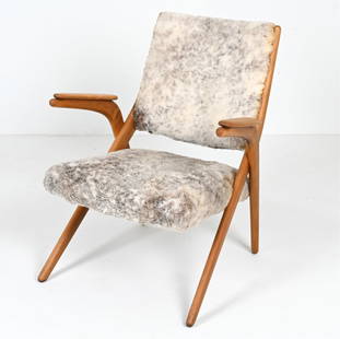 SCANDINAVIAN MODERN BEECH & LAMBSWOOL ARMCHAIR: Apparently unsigned; in the style of Arne Hovmand Olsen. Dimensions: H 31" x W 25" x D 28" S.H.16" Condition: Spots of minor soiling and discoloration to wool; a few rubs and small marks to wood frame