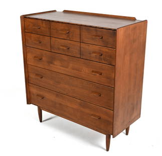 RUSSEL WRIGHT FOR CONANT BALL WALNUT TALL CHEST: Rare architectural tall chest of drawers in solid walnut, with sculpted handles and moldings. Designed by Russel Wright for Conant Ball, c. 1950's; stamped inside top drawer. Dimensions: H 42.5" x W