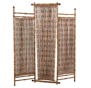 AESTHETIC MOVEMENT BAMBOO & FABRIC ROOM SCREEN: A highly decorative Victorian three-panel dressing screen in the Chinoiserie taste. Flame-treated bamboo and printed cotton fabric. Late 19th Century. Dimensions: (Folded) H 60.5 "x W 23" x D 3" Condi