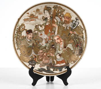 19TH C. JAPANESE SATSUMA EARTHENWARE CHARGER: With unusual figurative scene and moriage enamel work in high relief. Provenance: O. Rundle Gilbert Auctioneers, November 17-19, 1971, Lot 738. With auction catalog and receipt. Dimensions: H 2.25" x