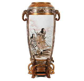 JAPANESE KUTANI EARTHENWARE FLOOR VASE: Monumental vase with two expressive hand-painted vignettes, accented with gilding and moriage work. Dimensions: H 29.5" x W 17" x D 12" Condition: Old repairs to feet and one handle. A few rubs to pai