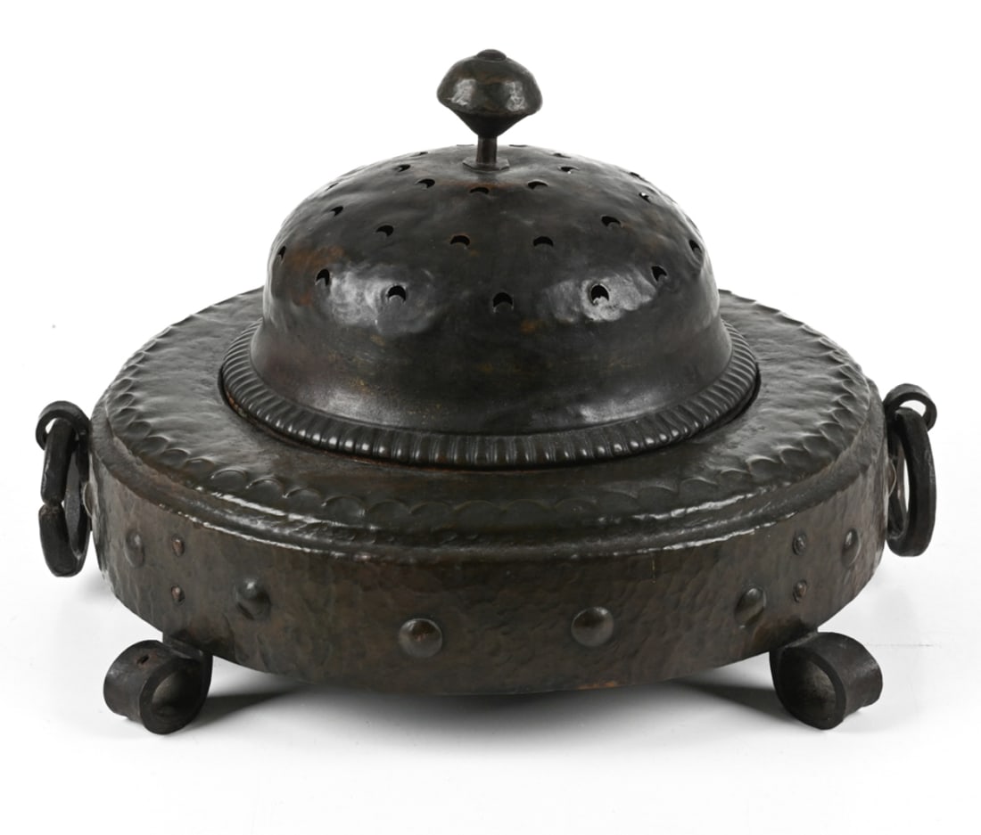 HAMMERED & PIERCED COPPER & IRON COVERED BRAZIER: Dimensions: (With cover) H 13" x Dia. 20" Condition: Natural patination throughout. Presents very well overall.