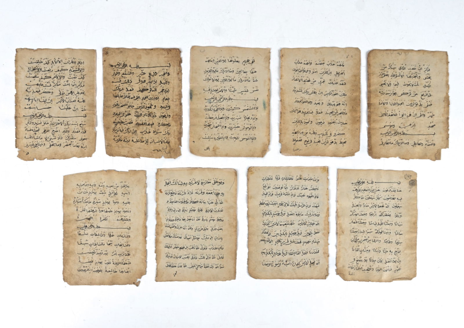 GROUPING OF (9) 17TH C. ARABIC MANUSCRIPT PAGES (1 of 16)