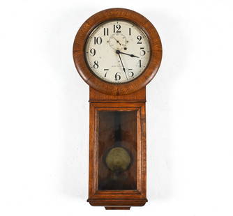 SETH THOMAS REGULATOR WALL CLOCK: Weight, pendulum and key included. Dimensions: H 36" x W 16" x D 5.5" Condition: Showing wear including age toning and small losses to face. Not tested.
