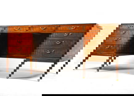 FRITS HENNINGSEN MAHOGANY EXECUTIVE DESK: Key included. Dimensions: H 29.75" x W 70.75" x D 35.5" Condition: Presents very well overall. Stress crack to one leg. Top refinished, some uneven stain application to edges. Minor sun fading to draw