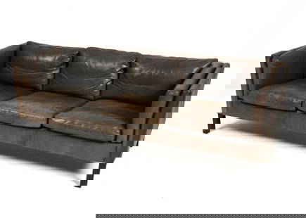 SCANDINAVIAN MODERN BUFFALO LEATHER SOFA: Classic Modern three-seat sofa in the manner of Mogens Hansen, finished in richly patinated dark brown buffalo leather with dark stained beech wood legs. Dimensions: H 26.5" x W 78" x D 28.5" x SH 16.