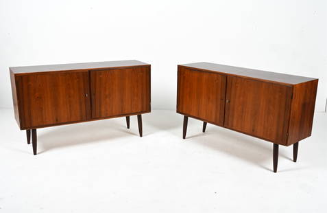 (2) CARLO JENSEN HUNDEVAD & CO ROSEWOOD SIDEBOARDS: Fantastic pair of petite sideboards in luxurious rosewood, designed by Carlo Jensen for Hundevad & Co., Denmark, c. 1960's. Keys included. One sideboard signed with Hundevad & Co. stamp to back panel.