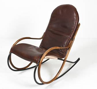 GERMAN BENTWOOD ROCKING CHAIR MANNER OF THONET: Unsigned.Dimensions: H 36.5" x W 22": x D 37" x SH 18"Condition: Showing normal signs of wear consistent with age and use including including a few marks to wooden elements. Some creasing to