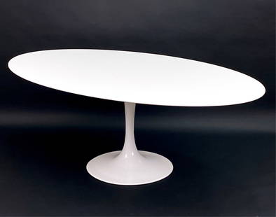 AFTER EERO SAARINEN KNOLL TULIP DINING TABLE: Contemporary tulip style dining table in the manner of Eero Saarinen for Knoll. Label under. Dimensions: H 29" x W 80" x D 47" Condition: Minor surface wear, marks, scuffs and scratches consistent wit