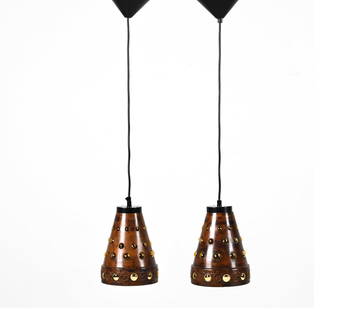 (2) NANNY STILL FOR RAAK PENDANT LAMPS, C. 1970'S: Glass and copper. Designed by Nanny Still for RAAK, Amsterdam, c. 1960's-1970's. Dimensions: (Pendant only) H 8.75" x Dia. 6.5" ; Overall height (including pendant, cord & canopy) measures 31.5" Condi