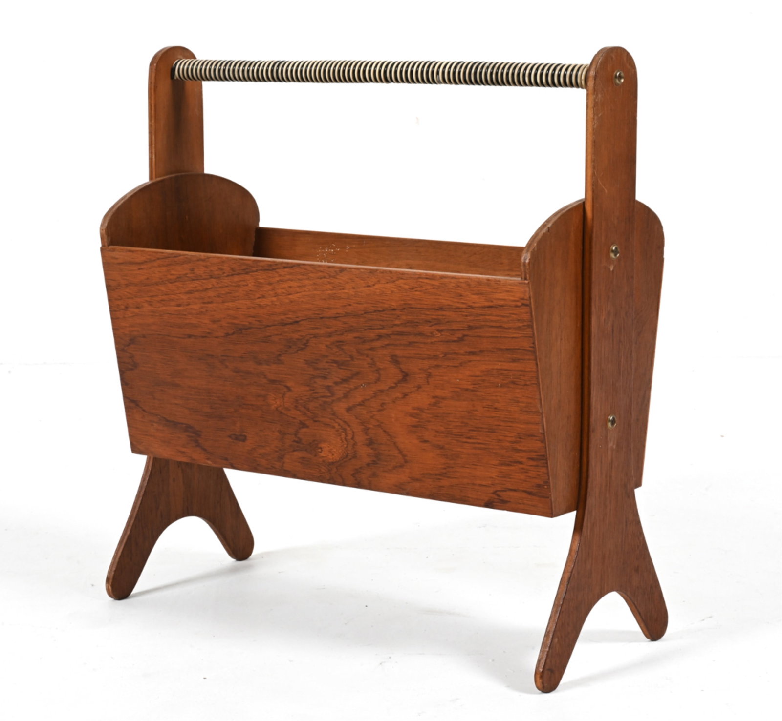 MID-CENTURY TEAK MAGAZINE RACK: With faux-rattan wrapped handle. Dimensions: H 17.25" x W 16.5" x D 7.5" Condition: Light wear consistent with age and use; a few scuffs and small water spots to wood; minimal toning and a few small m