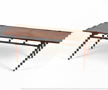 MANNER OF WILLIAM WATTING TEAK COFFEE TABLE: Mid-Century teak coffee table with sculpted cutouts; in the manner of William Watting for A. Mikael Laursen. European, c. 1950's-1960's. Dimensions: H 18.50" x W 58.25" x D 19.75" Condition: A few wat