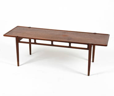 MANNER OF WILLIAM WATTING TEAK COFFEE TABLE: Mid-Century teak coffee table with sculpted cutouts; in the manner of William Watting for A. Mikael Laursen. European, c. 1950's-1960's. Dimensions: H 18.50" x W 58.25" x D 19.75" Condition: A few wat