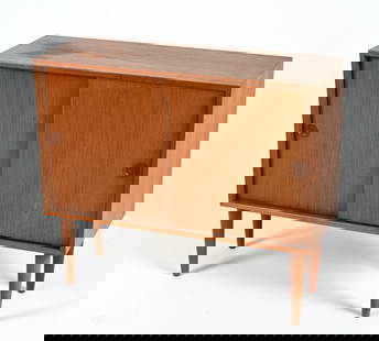 KAI KRISTIANSEN DANISH TEAK CREDENZA, 1960'S: Teak cabinet with sliding doors, designed by Kai Kristiansen for Feldballes Mobelfabrik, c. 1960's. Dimensions: H 30" x W 33.75" x D 12.5" Condition: Minor sun fading, a few water spots to top; a few
