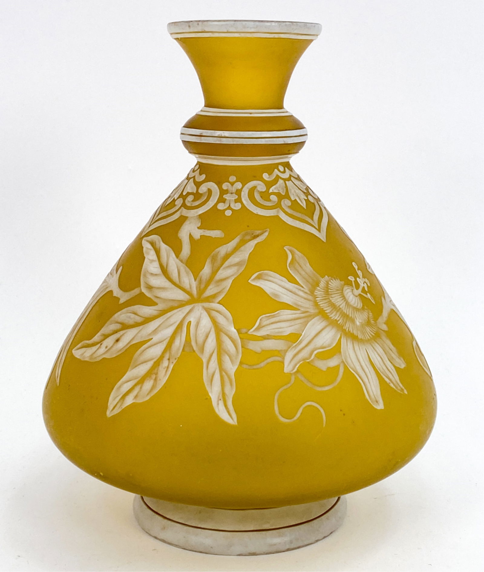 ATTR. THOMAS WEBB CAMEO GLASS VASE: Unsigned. Floral and butterfly detailing. Dimensions: H 7.5" x Dia 6" Condition: Light surface wear consistent with age and handling. Few light scratches to base.