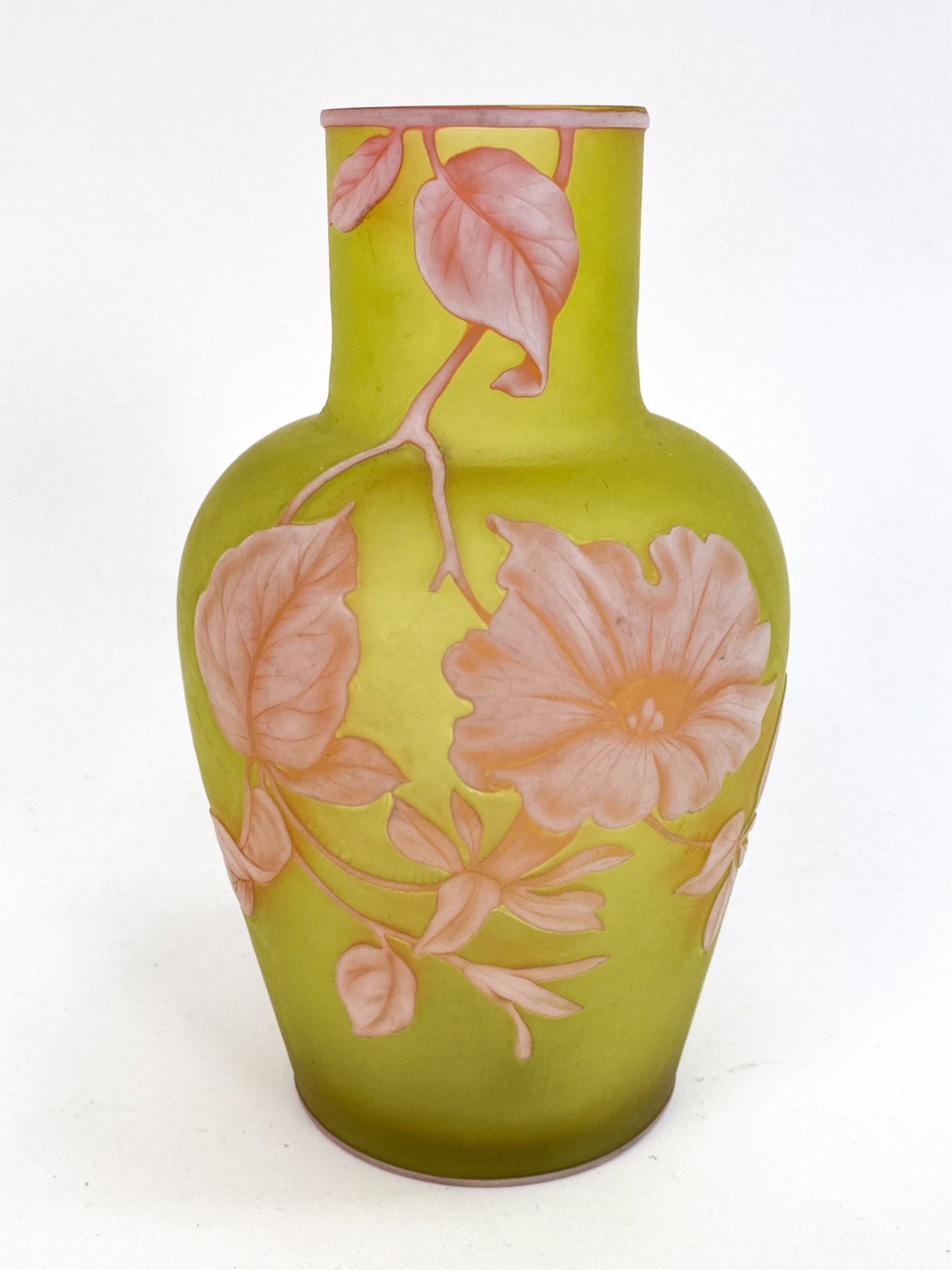 ATTR. THOMAS WEBB GREEN CAMEO GLASS VASE: Floral details. Unsigned Dimensions: H 5.5" x Dia 3.25" Condition: Bottom rim with flea bite.