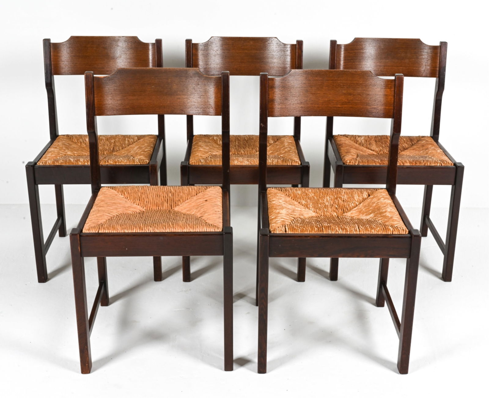 (5) STYLE OF MARTIN VISSER DUTCH OAK DINING CHAIRS: With woven seagrass rush seats; c. 1950's-1960's. Dimensions: H 33" x W 18" x D 18" x SH 18" Condition: Scattered nicks and dings, a few small gouges and rubs to finish. Wear consistent with age and u
