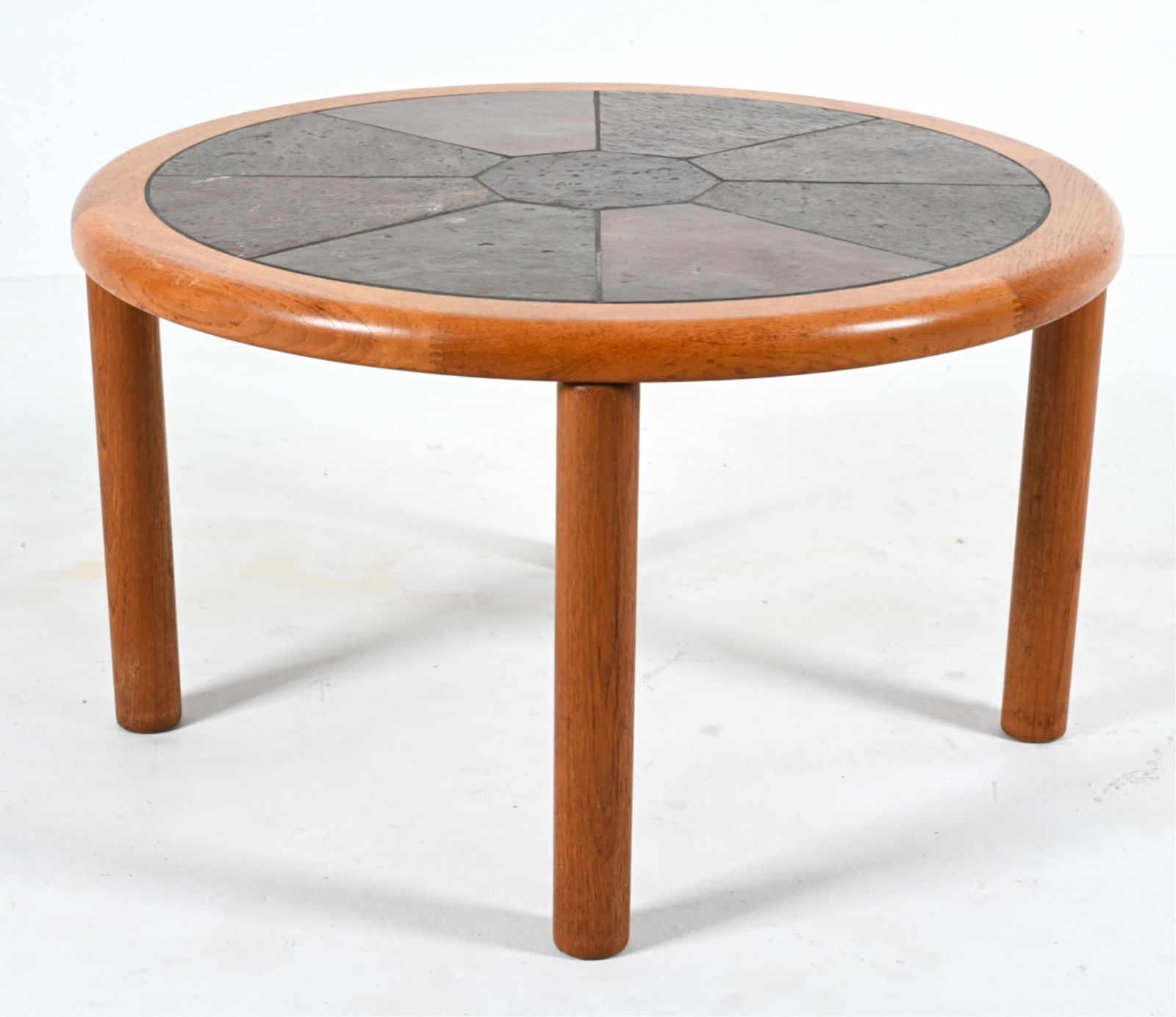 TUE POULSEN FOR HASLEV TEAK & SLATE COFFEE TABLE: Signed Haslev underneath. Denmark, c. 1960's. Dimensions: H 19.5" x Dia. 34" Condition: Wear with consistent age and use. moderate scuffing to the legs. PD104