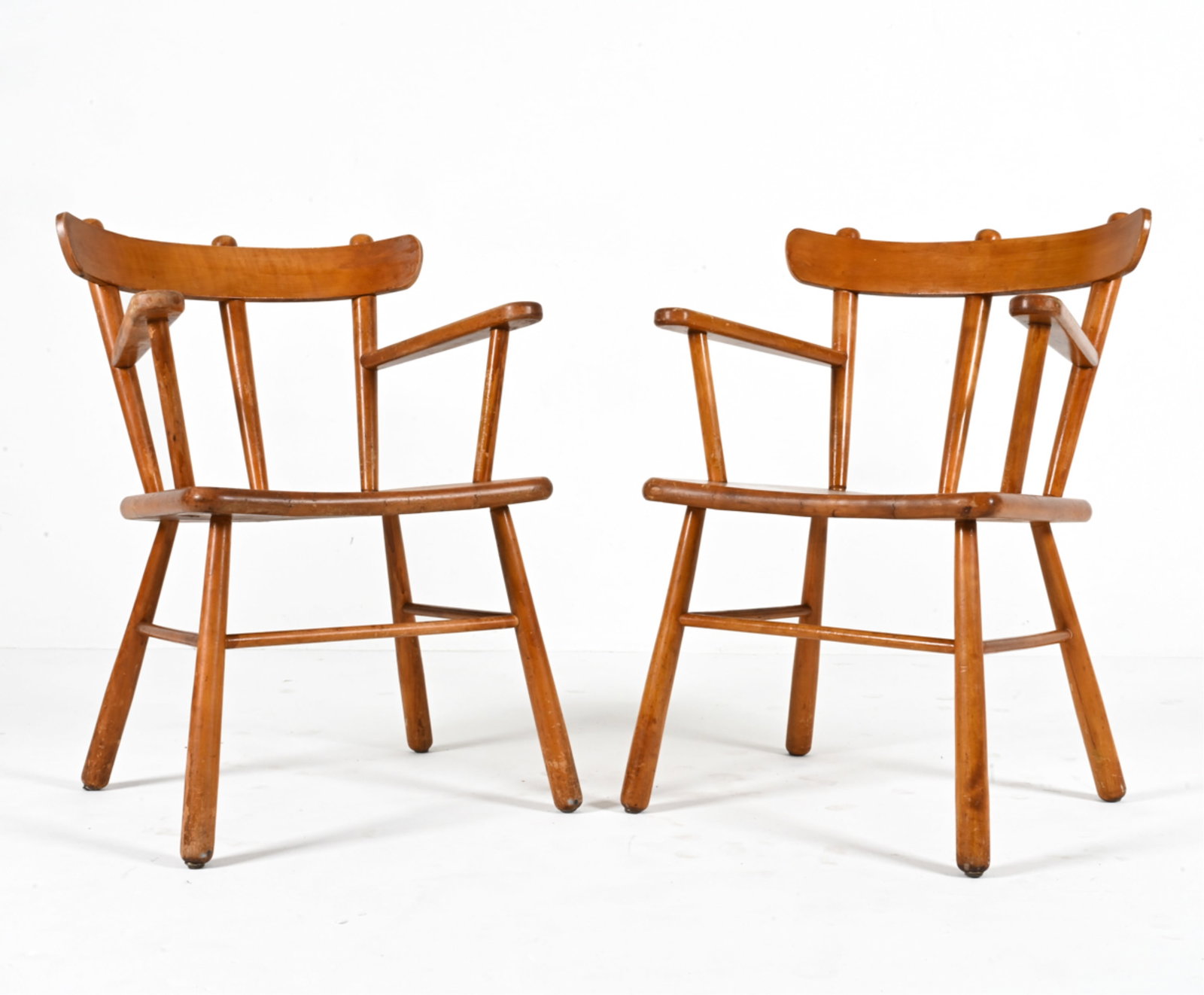PAIR OF MID-CENTURY BEECH ARMCHAIRS: Likely Swedish or Dutch, c. 1950's. Dimensions: H 32" x W 23" x D 20.5" x SH 18" Condition: Great candidates for refinishing; with finish losses, water spots, dings, and scuffs throughout; a few minor