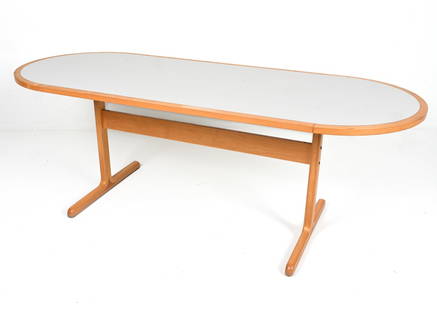 MODERN BENTWOOD & LAMINATE RACETRACK DINING TABLE: With trestle legs. In the style of Rud Thygesen and Johnny Sorensen; Scandinavian, c. Late 20th Century. Dimensions: H 28.25" x W 78.75" x D 31.5" Condition: Great candidate for refinishing; wood