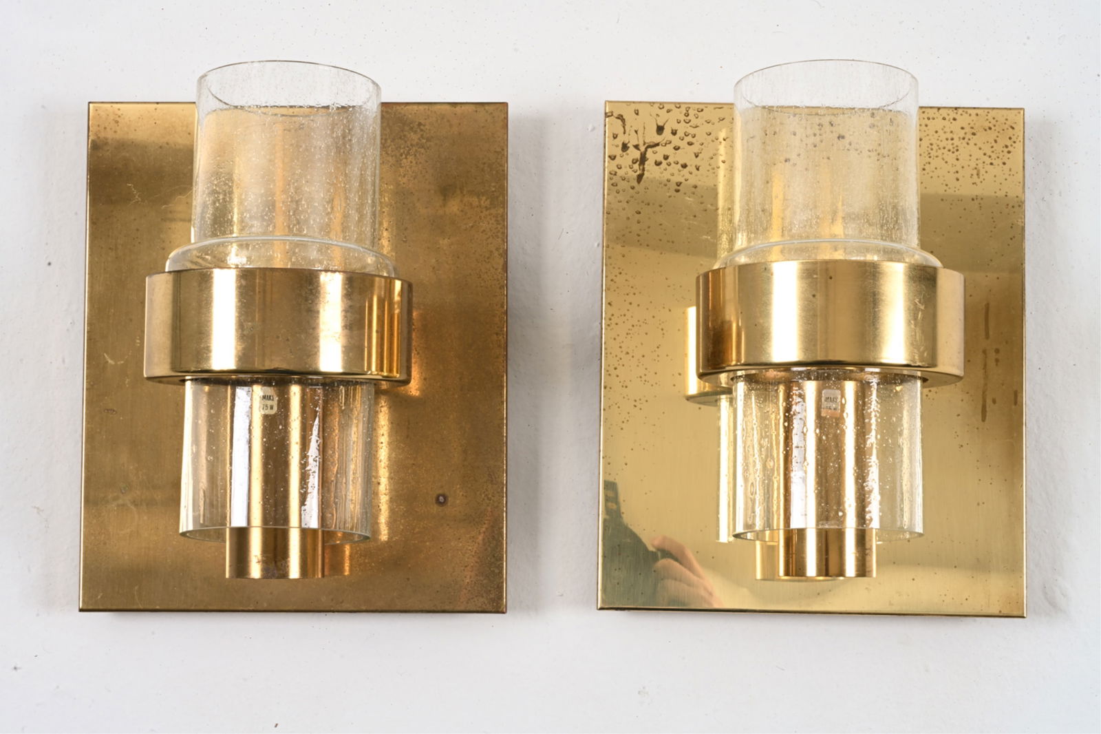 PAIR OF SCONCES; JONAS HILDE FOR HOVIK NORWAY: Brass and clear glass, with trapped bubble texture. Type 7360. Norway, c. 1970's. Dimensions: H 11.25" x W 9.5" x D 6" Condition: Wiring not tested. A few tiny nicks to glass. Brass with minor patinat