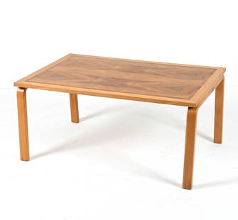 MANNER OF ALVAR AALTO BEECH & WALNUT COFFEE TABLE: Large cocktail table with beech bentwood legs and walnut parquetry top. Scandinavian, c. Mid- to Late 20th Century. Dimensions: H 19.75" x W 42.75" x D 28.5" Condition: Sun fading, water spots, dings