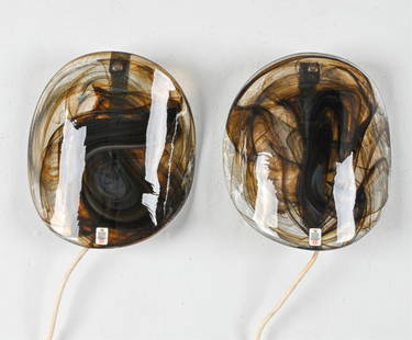 (2) PER LUTKEN FOR HOLMEGAARD ART GLASS SCONCES: With original labels. Denmark, c. 1970's-1980's. Dimensions: H 9" x W 8" x D 2.5" Condition: Wiring not tested; cords cut. Pair presents beautifully overall. Small inherent imperfection to one glass s