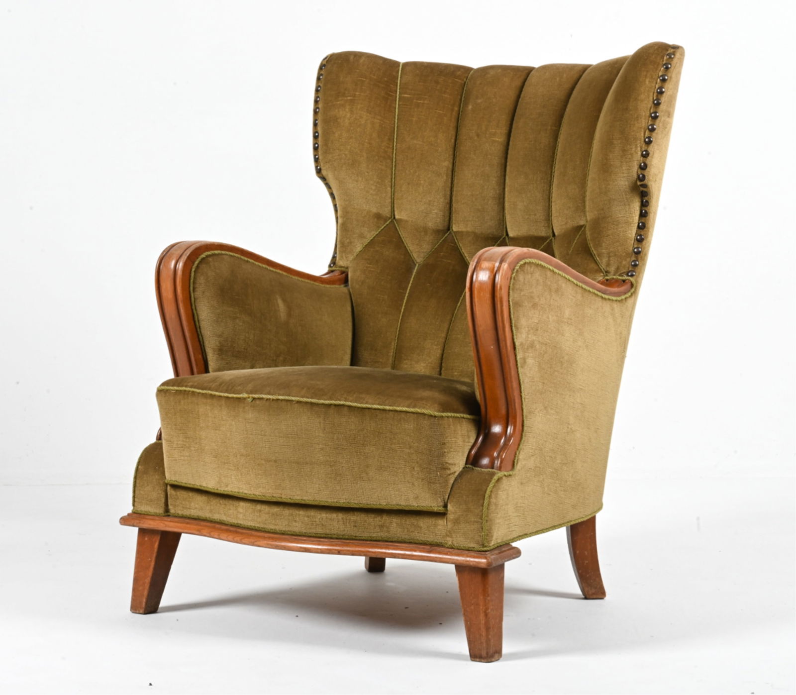 MANNER OF AXEL LARSSON OAK LOUNGE CHAIR, C. 1940'S: In the manner of Axel Larsson for Hjalmar Jackson. Oak and chenille. Swedish or Danish, c. 1940's. Dimensions: H 38" x W 28" x D 33" x SH 16" Condition: Small stress crack to back right leg. Wood fram