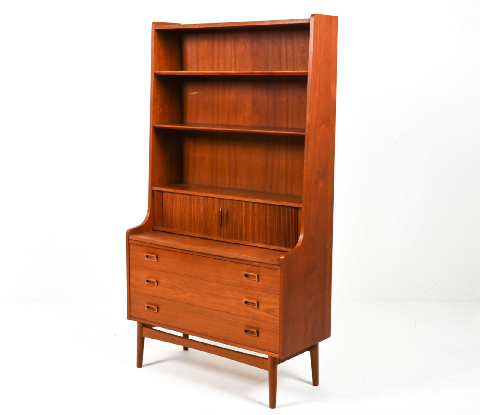 JOHANNES SORTH FOR NEXO TEAK SECRETARY BOOKCASE: With Model No. 330-131 and 1965 date stamp on back panel. Denmark. Dimensions: H 71.75" x W 39.5" x D 17" Condition: Presents very well overall. A few nicks and scuffs; one gouge to lower center drawe