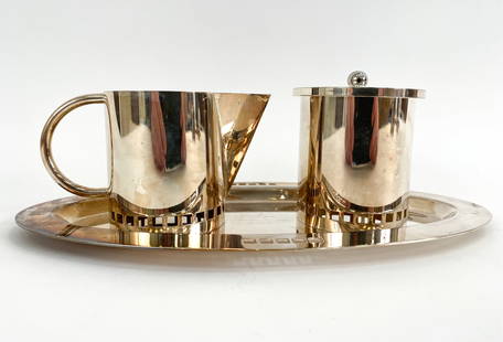 RICHARD MEIER SWID POWELL CREAM & SUGAR SET: Silver-plated brass and cobalt glass. Designed by Richard Meier for Swid Powell; Italy, c. 1980's. Signed underneath. Dimensions: (Tray) H .5" x W 5.5" x D 10.75" Condition: Minor surface wear, scratc