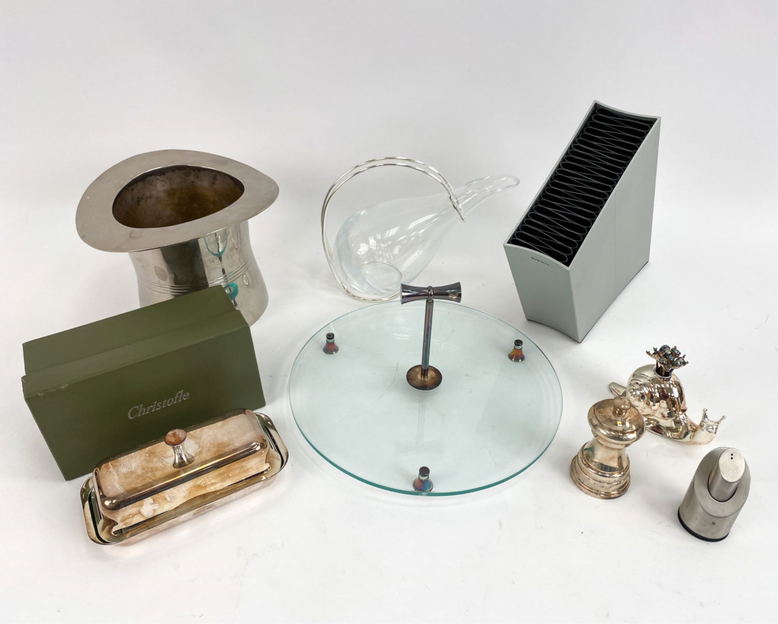 GROUPING OF MODERN TABLEWARE INCL. CHRISTOFLE: Includes: silverplate top hat wine cooler, silverplate snail-form escargot or cocktail fork set, silverplate butter dish and glass server by Christofle; and various others. Dimensions: (Knife block) H