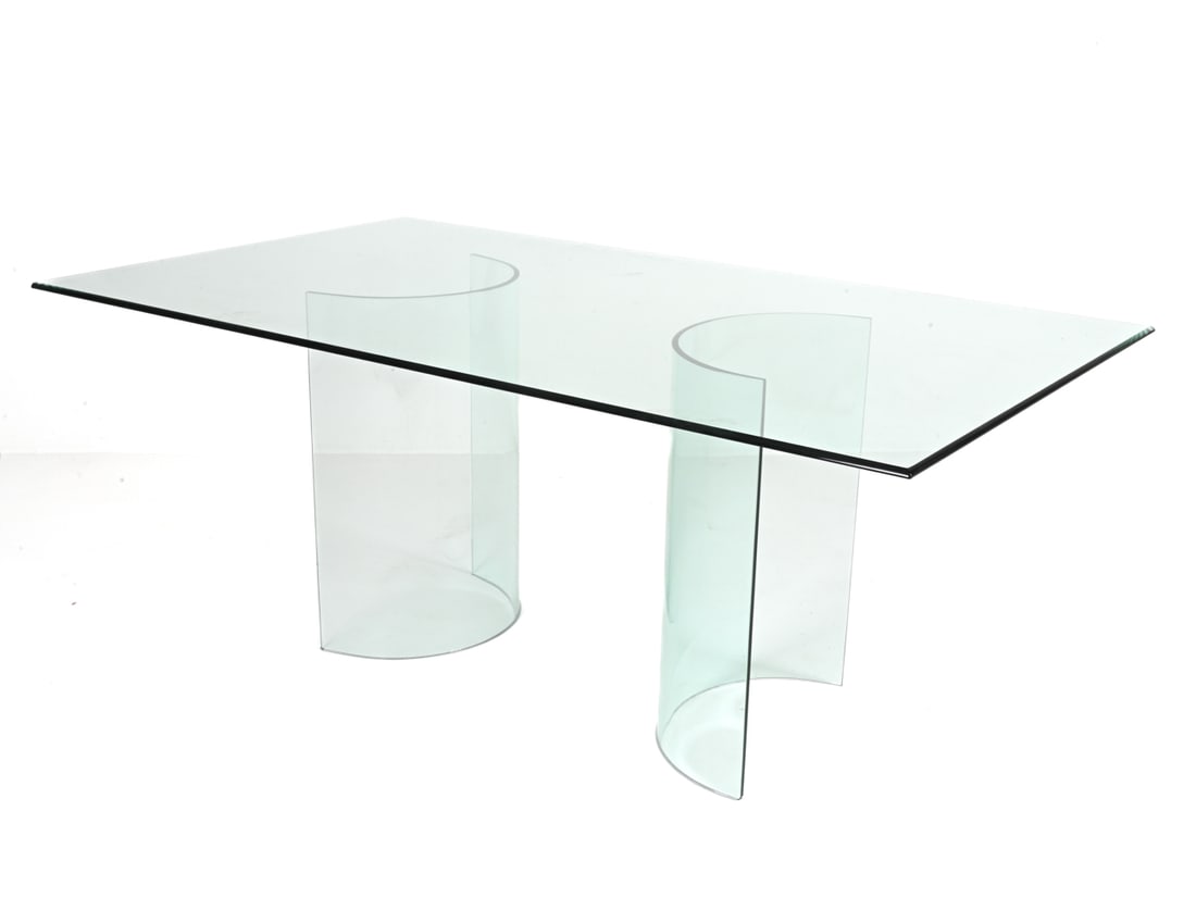 POSTMODERN TEMPERED GLASS DINING TABLE: Late 20th Century. Dimensions: H 29.5" x W 72" x D 42" Condition: Presents beautifully overall. Very small chip to bottom corner of one glass pedestal. A few faint scratches to glass.