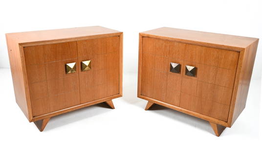 PAIR OF RARE PAUL FRANKL OAK CHESTS: Oak, with brass pyramid-form handles. First half of the 20th Century. Dimensions: H 36" x W 42" x D 21" Condition: Pair presents well overall. Several retouched chips and losses to veneer; one chest w