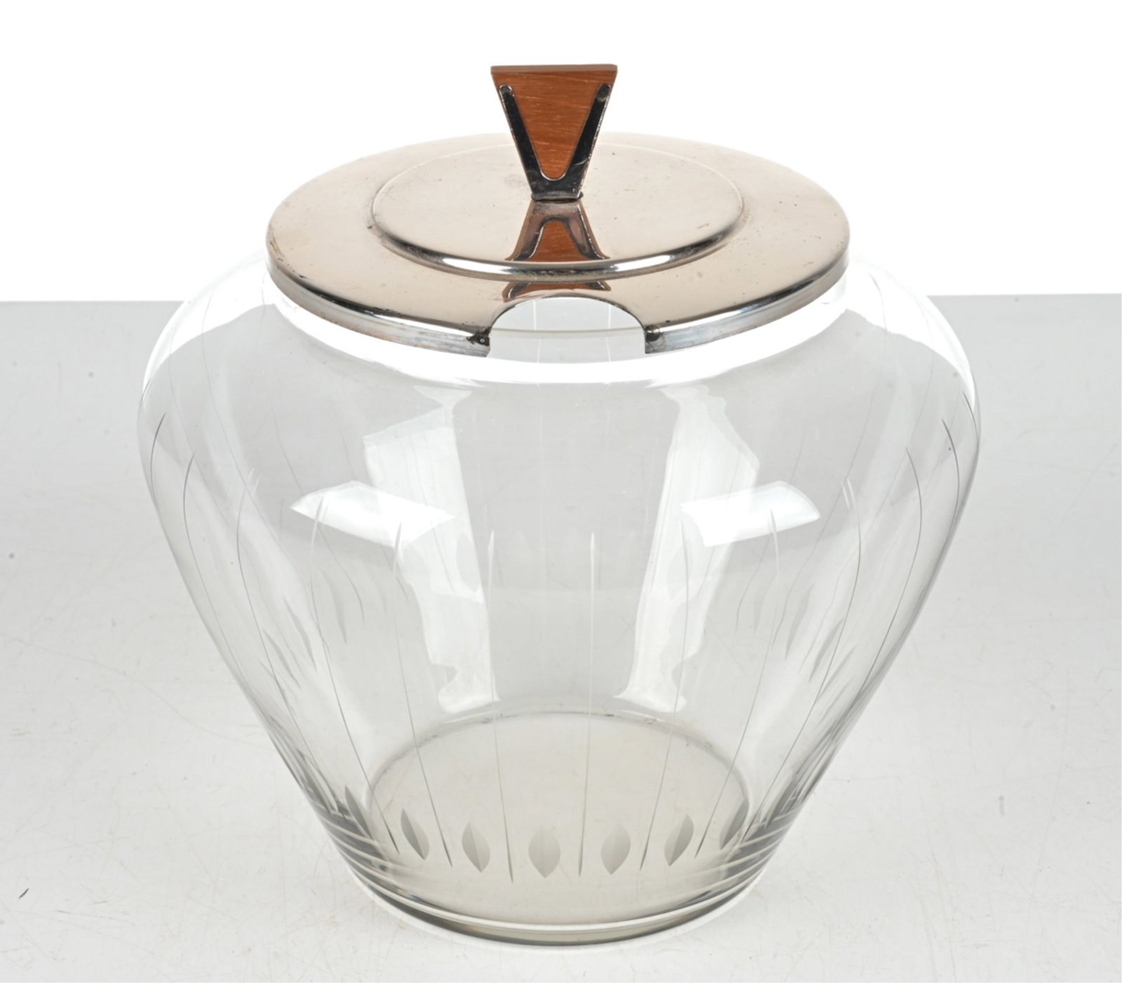 MID-CENTURY ETCHED GLASS COVERED PUNCH BOWL: With teak accent at the lid. German, circa 1960's. Dimensions: H 8.5" x Dia. 8". Condition: A few scuffs and small finish losses to lid. One scallop to glass rim. Presents well overall. PE139