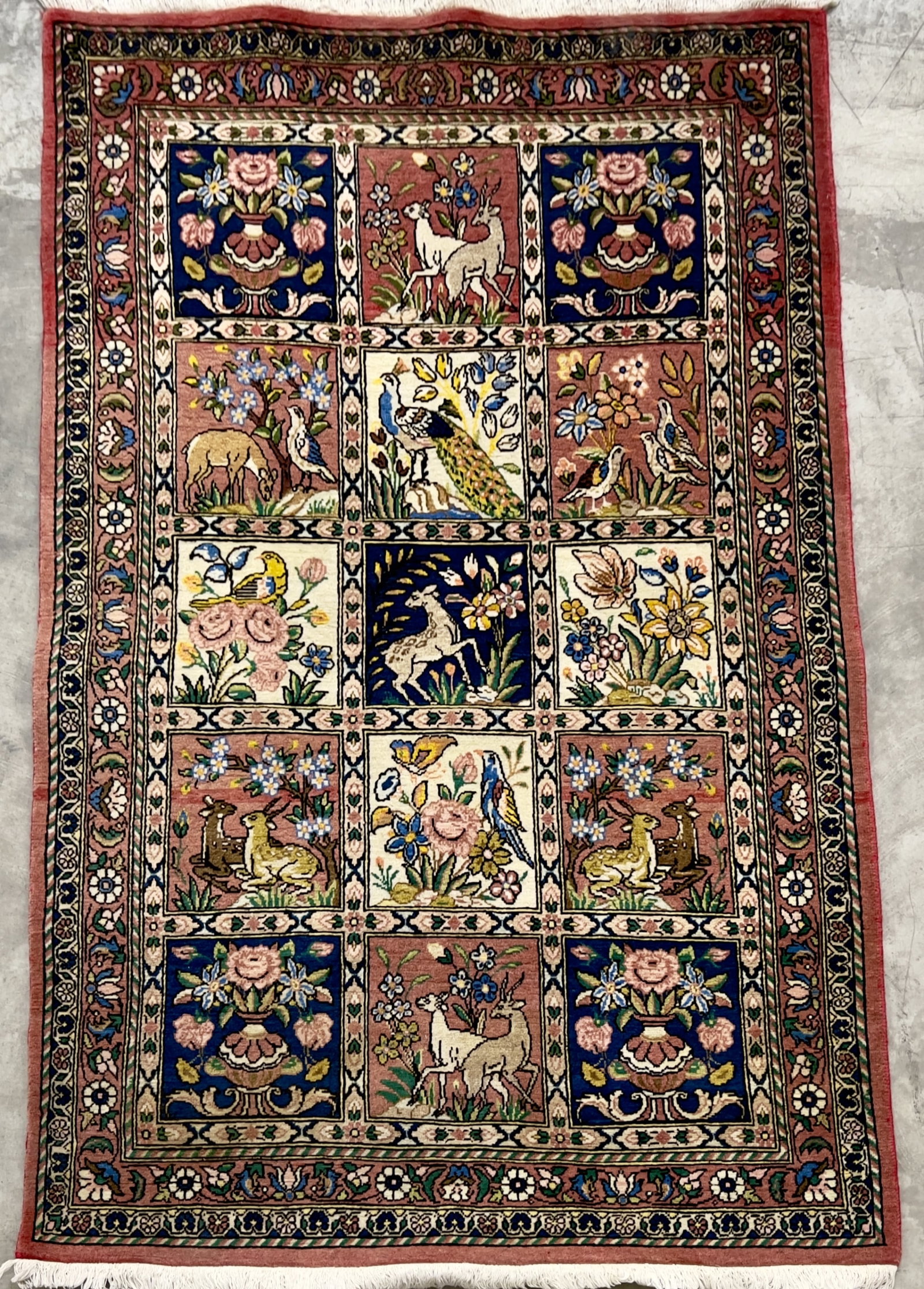 VINTAGE PICTORAL PERSIAN AREA RUG: Small Persian garden of Eden area rug, wool on cotton. Dimensions: H 65" X W 40" Condition: Good vintage condition.